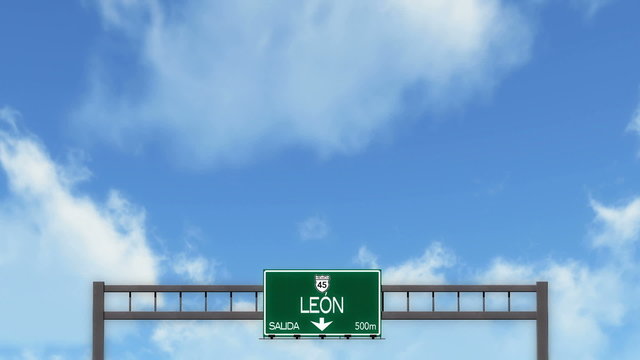 Passing under Leon Mexico Highway Road Sign
  