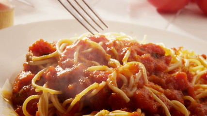 Eating plate of spaghetti - Powered by Adobe