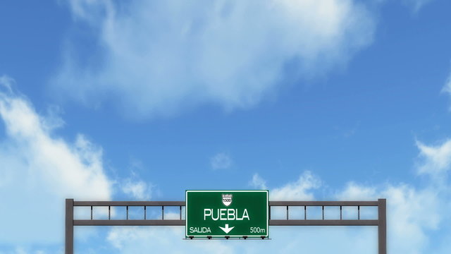 Passing under Puebla Mexico Highway Road Sign
  