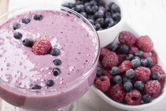 Smoothies of frozen raspberries and   blueberries and   with yo