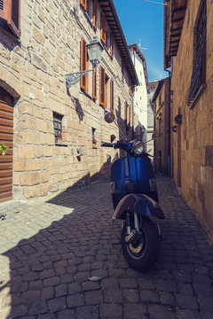 Classic Italian mode of transport through the narrow winding str