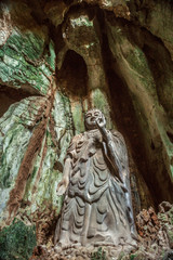 Fototapeta na wymiar Statue of Budda in Marble Mountains, Vietnam