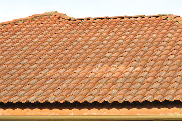 roof tile pattern over blue sky