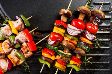 Grilled skewers of fish and vegetables