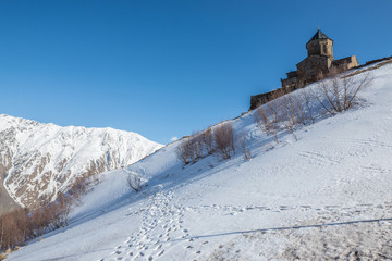 14th century Holy Trinity Church (Tsminda Sameba) near Mount Kazbek in Georgia