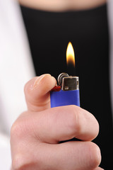 Hand Holding a Lighter