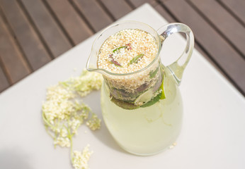 Summer cold drink with elder berry and lime