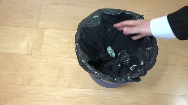hand crumple one hundred 100 euro banknote and drop in bin. 4K