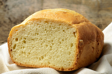 Loaf of bread on the linen napkin,