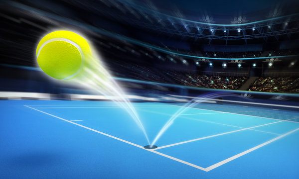 flying tennis ball on a blue court in motion blur