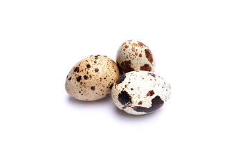 quail eggs on a white, isolated background