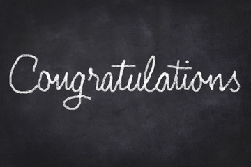 congratulations -  text on chalkboard ,  handwritten
