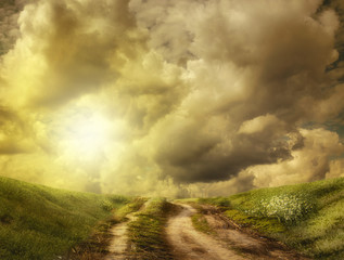 Road to the hill in the clouds