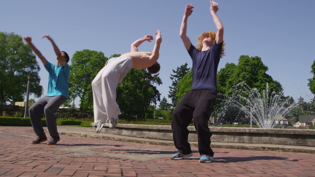 Three runners back flip