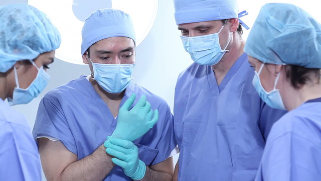 Group of surgeons in operating room