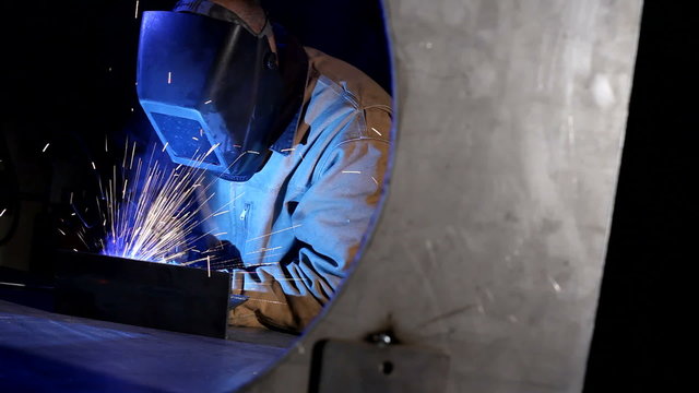 Industrial worker welding