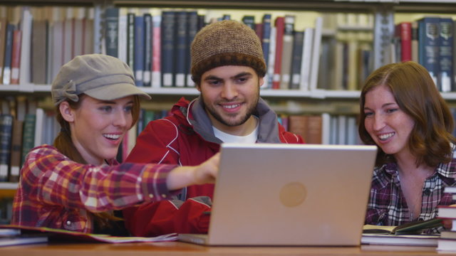 Group of college students in library