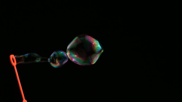 Blowing bubbles, slow motion