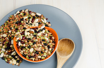 legumes in a dish on table, close up, background