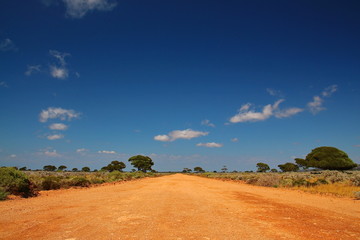Fototapeta na wymiar Unpaved road in Australian outback