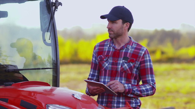 Farmer Using Digital Tablet