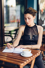 Attractive girl with a notepad