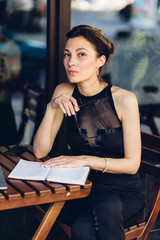 Attractive business woman working at his laptop