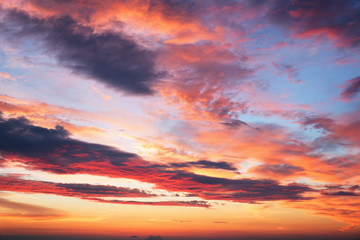 Naklejka na ściany i meble sunset sky with multicolor clouds