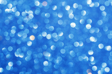 Blue blurred lights. Glittering abstract background