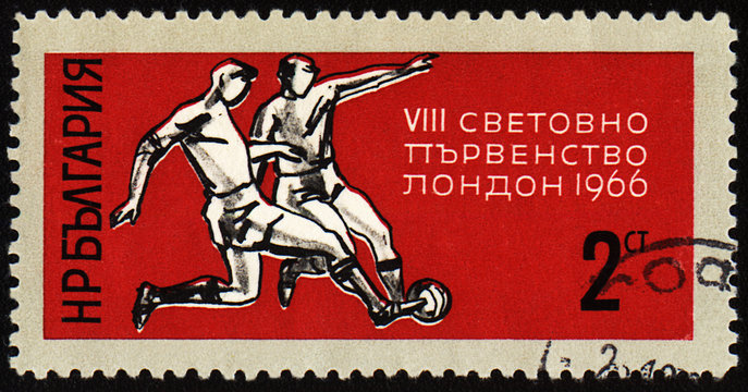 Football players on post stamp
