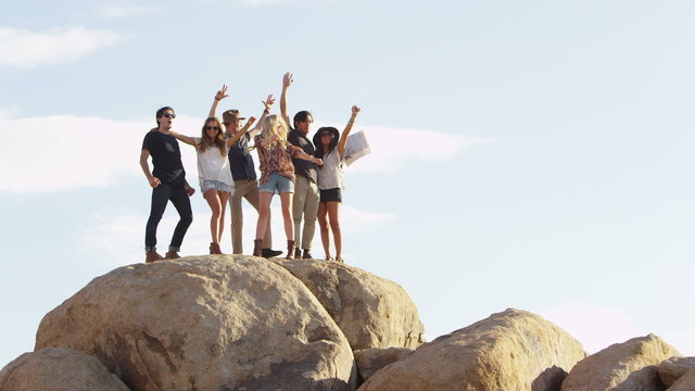 Group of young people on rocks 