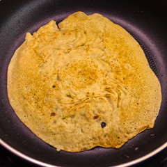 Fried pancake on pan