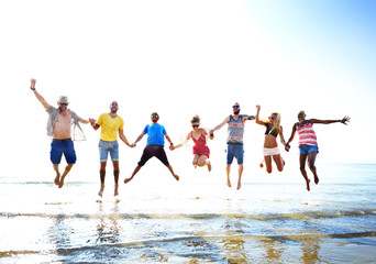 Diverse Beach Summer Friends Fun Jump Shot Concept