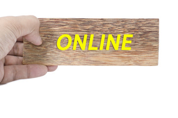 hand holding plain brown wood with word online isolated white background