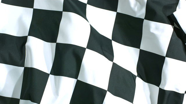 Checkered flag waving in wind, slow motion