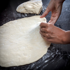 Closeup of a chicken and potato pie cooking process © yarlander