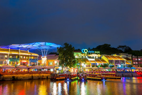 olorful light building at night in Clarke Quay, Singapore
