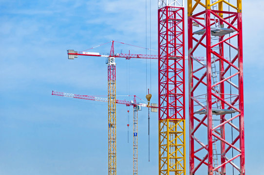 construction cranes in the blue sky in panorama picture