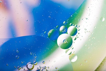 Fototapeta premium Abstract background of oil droplets on water surface