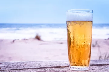 Poster Glass of beer on the beach © Three Goats Studio