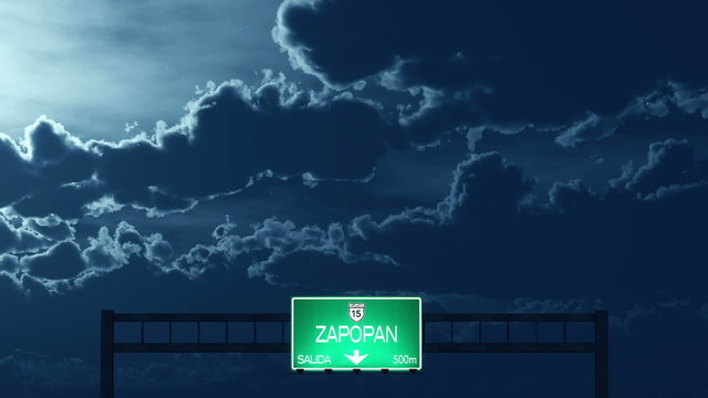 Passing under Zapopan Mexico Highway Road Sign at Night
  