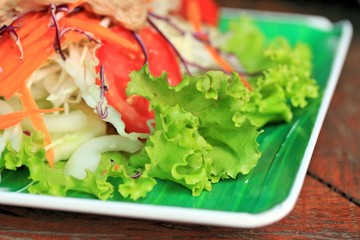 Tuna salad on lettuce and cream sauce