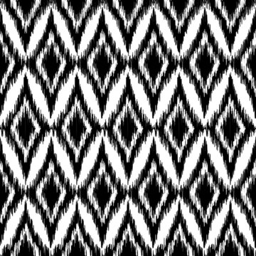 Vector seamless black and white ikat ethnic pattern