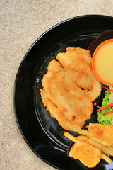 Steaks, french fries with vegetables salad on a plate
