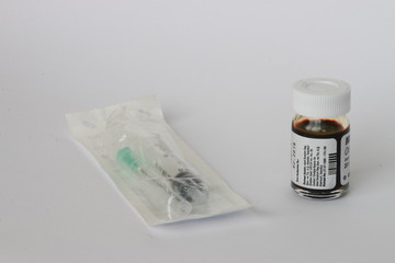 injection and drug bottle