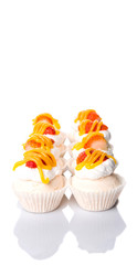 Mini pavlova with strawberry topping over white background