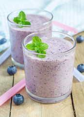 Fresh smoothie with blueberry, banana and yogurt