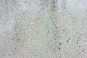 Textured walls with dirt.