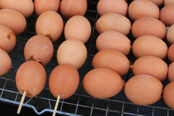 Grilled chicken eggs on the stove.