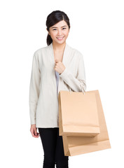 Young woman holding shopping bag